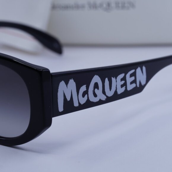 Alexander McQueen AM0330S 001 Oval Sunglasses - Black/Grey Alexander McQueen Womens Round/Oval Black Black Grey Fashion  main image 4